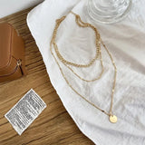 Céleste Gold Layered Charm Necklace