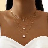Céleste Gold Layered Charm Necklace