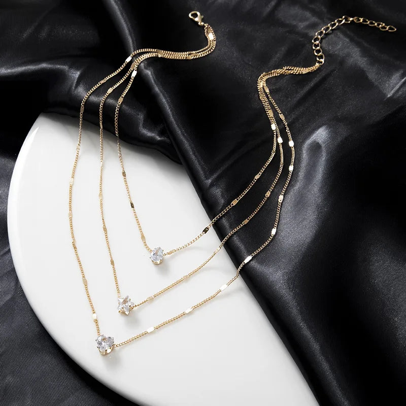 Céleste Gold Layered Charm Necklace