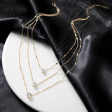 Céleste Gold Layered Charm Necklace
